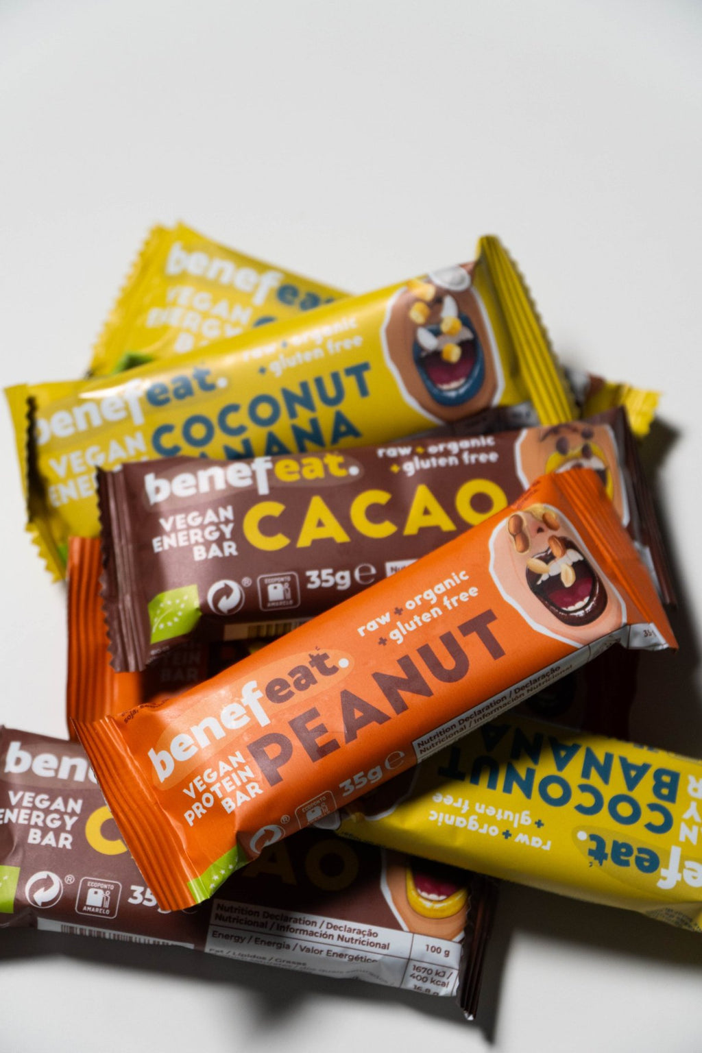 Coconut Banana, Cacao and Peanut bars piled together