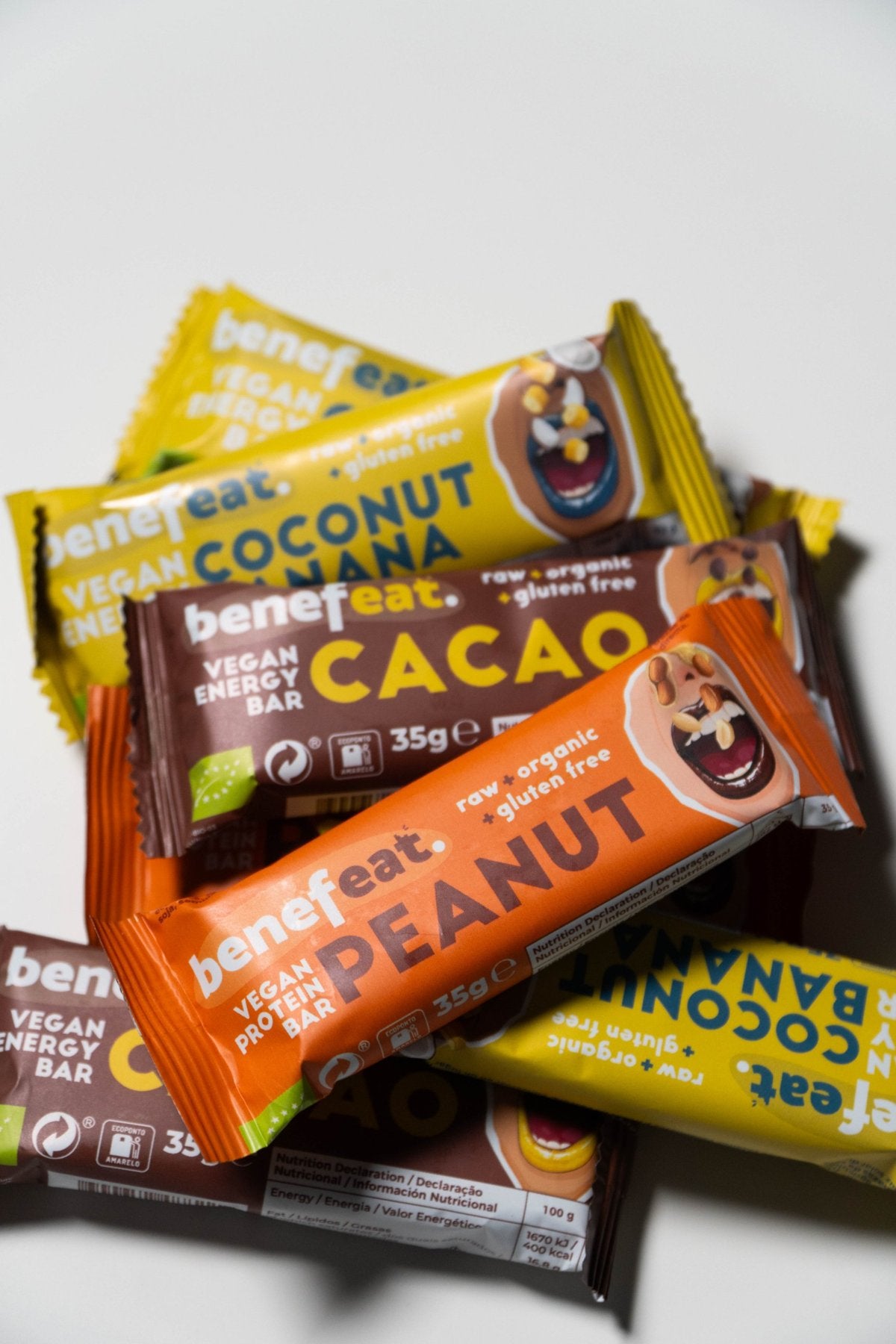 Coconut Banana, Cacao and Peanut bars piled together