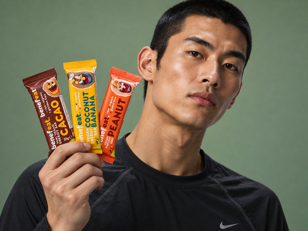 Man holding Cacao, Coconut Banana and Peanut bars